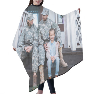Personality  Smiling Military Father And Mother With Daughter Sitting On House Threshold Hair Cutting Cape