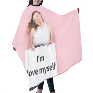 Personality  Cheerful Overweight Girl Holding Placard With I Love Myself Inscription And Sticking Out Tongue On Pink  Hair Cutting Cape