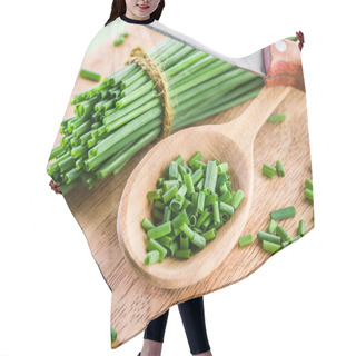 Personality  Green Onion On The Wooden Table. Hair Cutting Cape