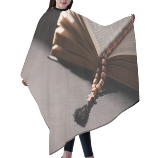 Personality  Holy Bible With Rosary On Black Dark Background With Sunlight  Hair Cutting Cape