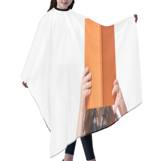 Personality  Panoramic Shot Of Pupil Covering Face With Orange Book Isolated On White  Hair Cutting Cape