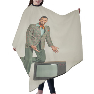 Personality  Smiling Man In Elegant Retro Style Attire Pointing At Vintage Tv Set On Grey Backdrop, Full Length Hair Cutting Cape