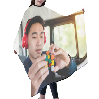 Personality  BANGKOK, THAILAND - October 31, 2018: Suwat Ruchimethakun Is Programmer. He Holding Rubik's Cube - Techincal And Business Solving Problem And Brain Training Concept. Travel Activities In Van. Hair Cutting Cape