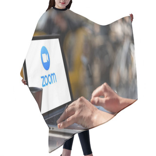 Personality  Antalya, TURKEY - March 30, 2020. Laptop Showing Zoom Cloud Meetings App Logo. Hair Cutting Cape