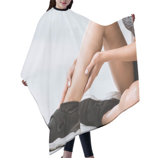 Personality  Partial View Of Sportswoman With Ankle Pain On Grey Hair Cutting Cape