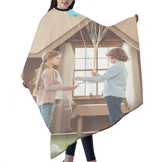 Personality  Kid Presenting Balloons To Beautiful Little Girlfriend In Front Of Cardboard House Hair Cutting Cape
