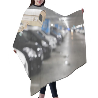 Personality  CCTV Camera On Blurred Cars Parking And Bokeh Light. Hair Cutting Cape