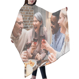 Personality  Smiling Multicultural Friends Talking And Clinking With Wine Glasses During Dinner  Hair Cutting Cape