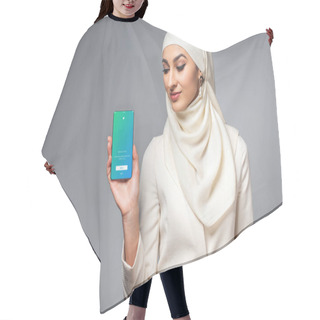 Personality  Beautiful Smiling Young Muslim Woman Holding Smartphone With Twitter App Isolated On Grey Hair Cutting Cape