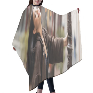 Personality  Smiling Brunette Woman In Stylish Coat Posing Near Lamppost In Prague, Banner Hair Cutting Cape