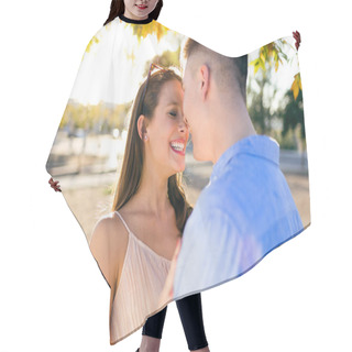 Personality  Beautiful Young Couple In Love In The Park. Hair Cutting Cape