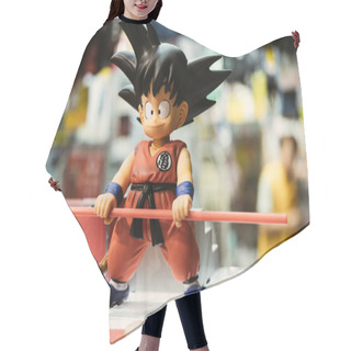 Personality  Tokyo, Japan - 10/09/2019; Son Goku Kid From Dragon Ball In A Quiet Position With His Magic Cane. Hair Cutting Cape