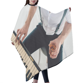 Personality  Cropped View Of Pianist Holding Glass Of Alcohol Drink While Playing Piano  Hair Cutting Cape