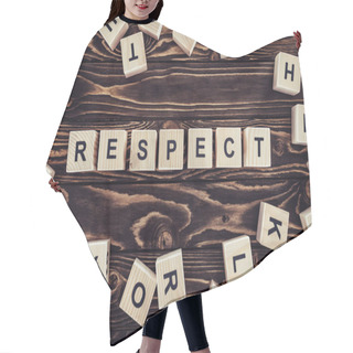 Personality  Flat Lay With Arranged Wooden Blocks In Respect Word On Brown Wooden Surface Hair Cutting Cape