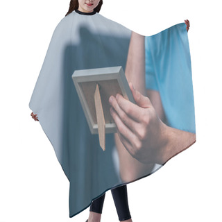 Personality  Cropped View Of Man Holding Photo Frame With Copy Space Hair Cutting Cape