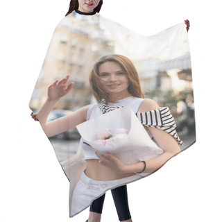 Personality  Stylish Woman Holding Bouquet Of Flowers Wrapped In Paper While Gesturing On Street In Paris  Hair Cutting Cape