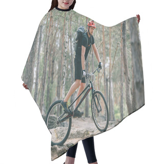 Personality  Young Male Extreme Cyclist In Protective Helmet Riding On Mountain Bicycle In Forest Hair Cutting Cape