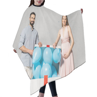 Personality  Positive Pregnant Woman In Elegant Dress Opening Bog Gift Box With Blue Balloons While Standing Near Husband Under Confetti During Baby Shower On Grey Background, Gender Party, It`s A Boy Hair Cutting Cape