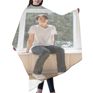 Personality  Preteen Asian Boy Sitting On Windowsill At Home  Hair Cutting Cape