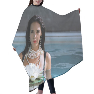 Personality  Attractive Woman In Pearl Necklace Posing In Pool With Lotus  Hair Cutting Cape