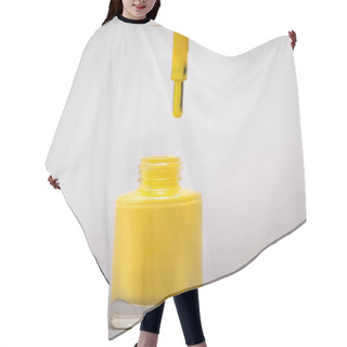 Personality  Bottle With Yellow Nail Polish And Brush On Grey Background  Hair Cutting Cape