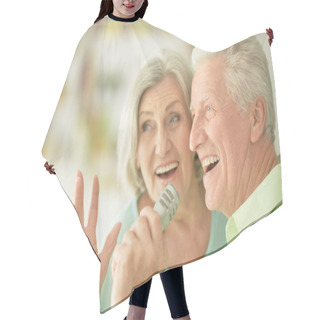 Personality  Senior Couple With Headphones  Hair Cutting Cape