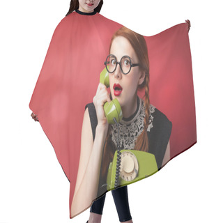 Personality  Redhead Girl With Green Phone On Red Background. Hair Cutting Cape
