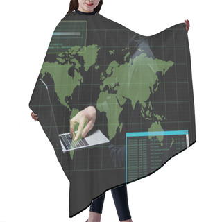 Personality  Cropped View Of Hacker In Hood Using Laptop Near World Map On Black  Hair Cutting Cape