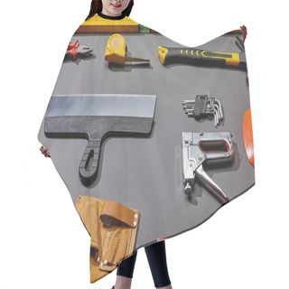 Personality  High Angle View Of Spirit Levels, Pliers, Measuring Tape, Hammer, Putty Knife, Angle Keys, Stapler And Tool Belt On Grey Background  Hair Cutting Cape