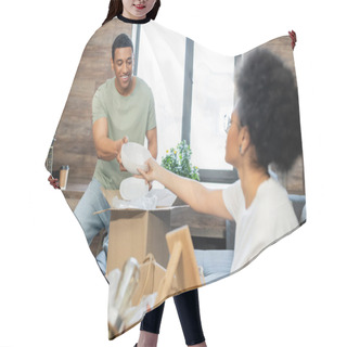 Personality  Blurred African American Woman Giving Tableware To Boyfriend Near Boxes In New House Hair Cutting Cape