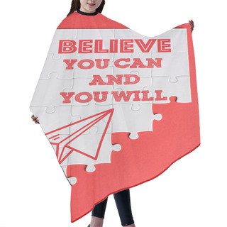 Personality  Top View Of White Connected Puzzle Pieces With Paper Plane And Believe You Can And You Will Lettering Isolated On Red  Hair Cutting Cape