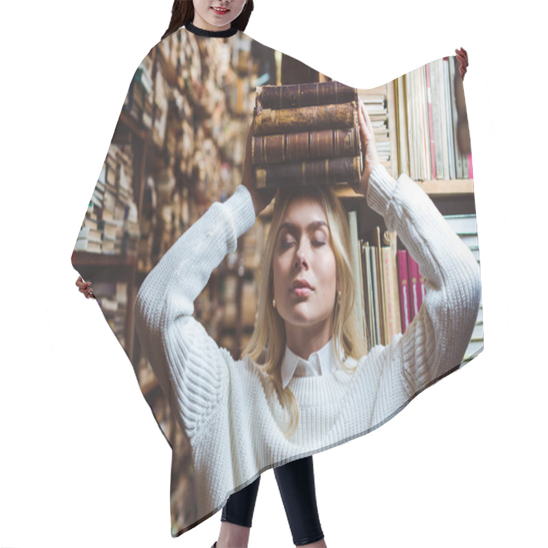 Personality  Blonde And Attractive Woman With Closed Eyes Holding Books In Library  Hair Cutting Cape