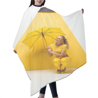 Personality  Happy Blonde Girl Holding Umbrella While Sitting On White And Yellow  Hair Cutting Cape