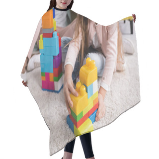 Personality  Cropped View Of Child Playing Building Blocks Near Mother On Carpet  Hair Cutting Cape
