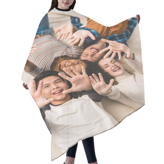 Personality  Overhead View Of Smiling Multiethnic Teens Waving Hands Hair Cutting Cape