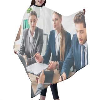 Personality  Selective Focus Of Recruiter Talking To Employee With Resume Near Colleagues At Table  Hair Cutting Cape