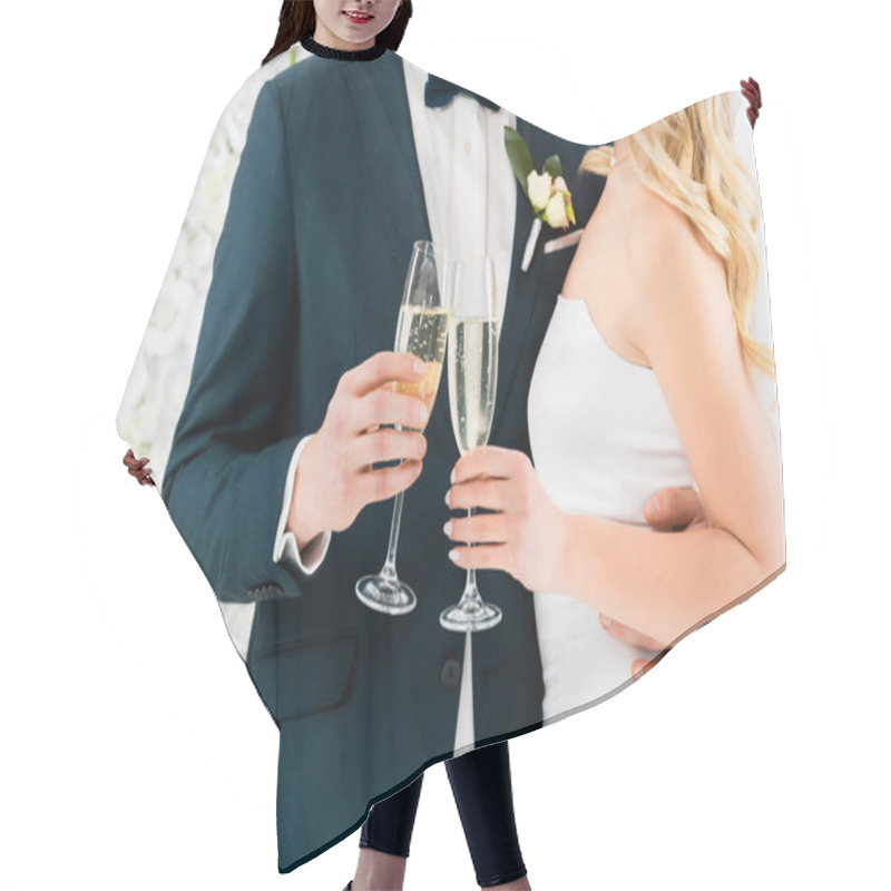 Personality  Cropped View Of Groom And Bride Holding Glasses Of Champagne On White Floral Background Hair Cutting Cape