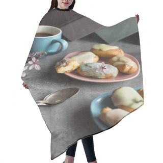 Personality  Profiteroles With Butter Cream And Topping On The Plate Against Grey Background. Coffee Break Pause. Pastel Shades. Hair Cutting Cape