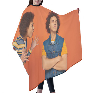 Personality  Angry Very Unhappy African American Woman Looking Emotionally At Her Brother On Orange Backdrop Hair Cutting Cape