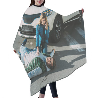 Personality  High Angle View Of Scared Young Woman Calling Emergency And Touching Injured Man On Road After Traffic Accident Hair Cutting Cape