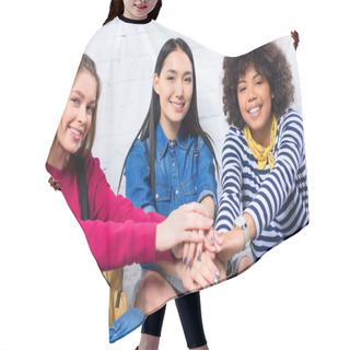 Personality  Portrait Of Smiling Multicultural Students Holding Hands Together Hair Cutting Cape