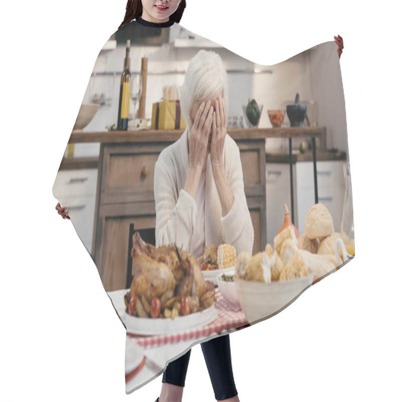 Personality  depressed woman obscuring face with hands while sitting at table served with thanksgiving dinner hair cutting cape