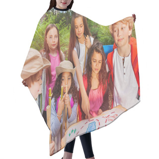 Personality  Group Of Kids In Forest Examine And Point With Finger On Map During Treasure Hunting Hike Activity In Summer Camp Hair Cutting Cape