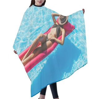 Personality  Young Woman In Black Swimsuit And Straw Hat Sunbathing On Pink Inflatable Mattress In Swimming Pool  Hair Cutting Cape