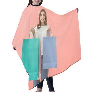 Personality  Smiling Woman In White Sweater And Jeans Holding Shopping Bags Isolated On Pink Hair Cutting Cape