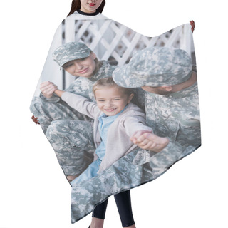 Personality  Happy Military Father And Mother With Daughter Sitting On House Threshold On Blurred Background Hair Cutting Cape