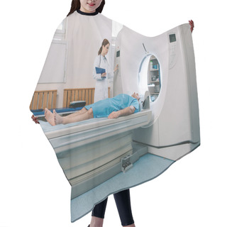 Personality  Young Radiographer Operating Ct Scanner While Preparing Patient For Tomography Hair Cutting Cape
