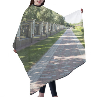Personality  Walkway With Paving Stones Near Green Grass And Fence  Hair Cutting Cape
