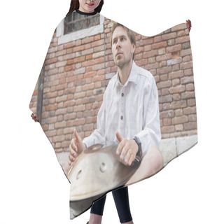 Personality  Street Musician Holding Handpan Outdoors In Venice  Hair Cutting Cape