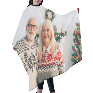 Personality  Happy Senior Couple Looking At Camera With Christmas Decoration On Background Hair Cutting Cape